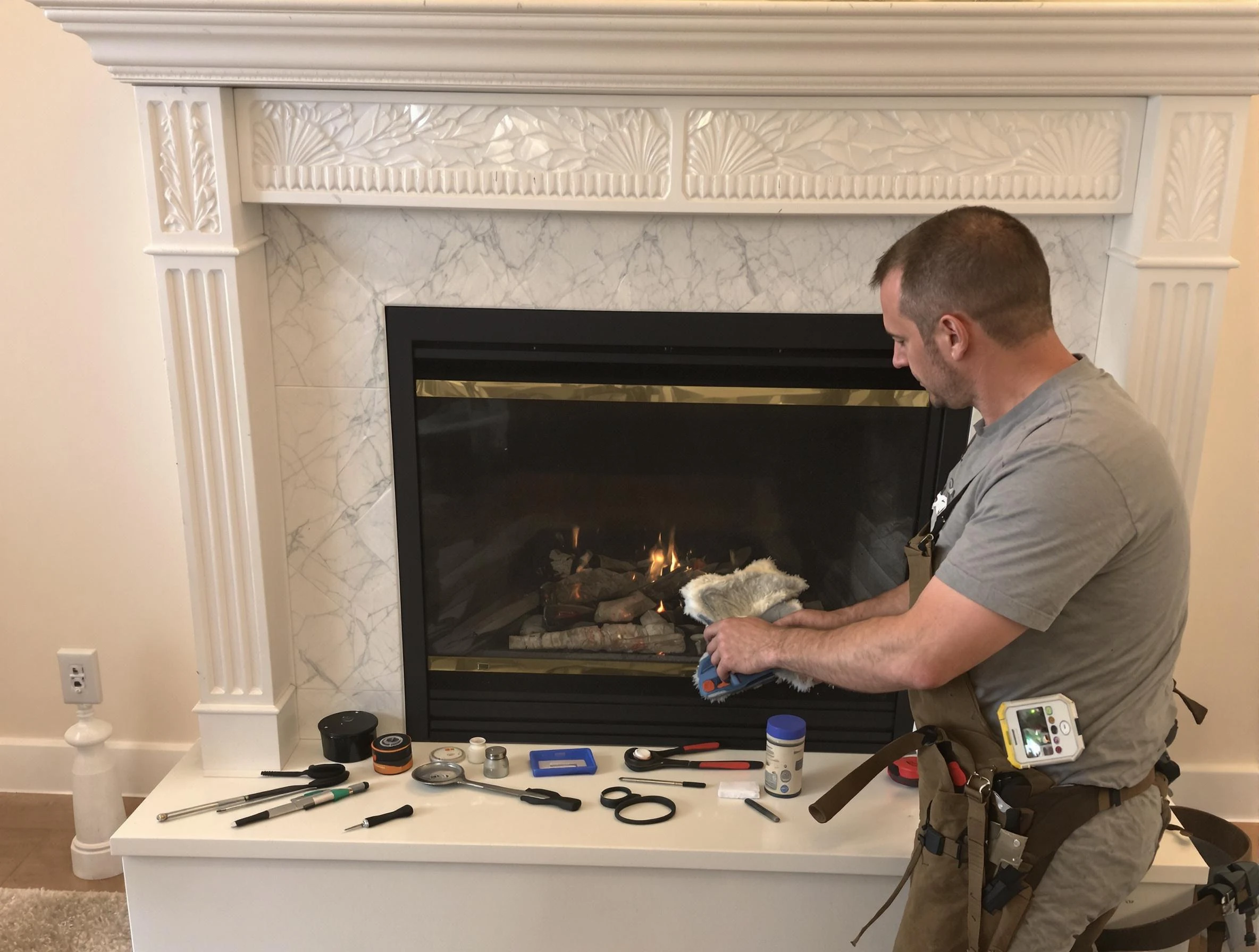 Hingham Chimney Sweep performing fireplace maintenance in Hingham, MA